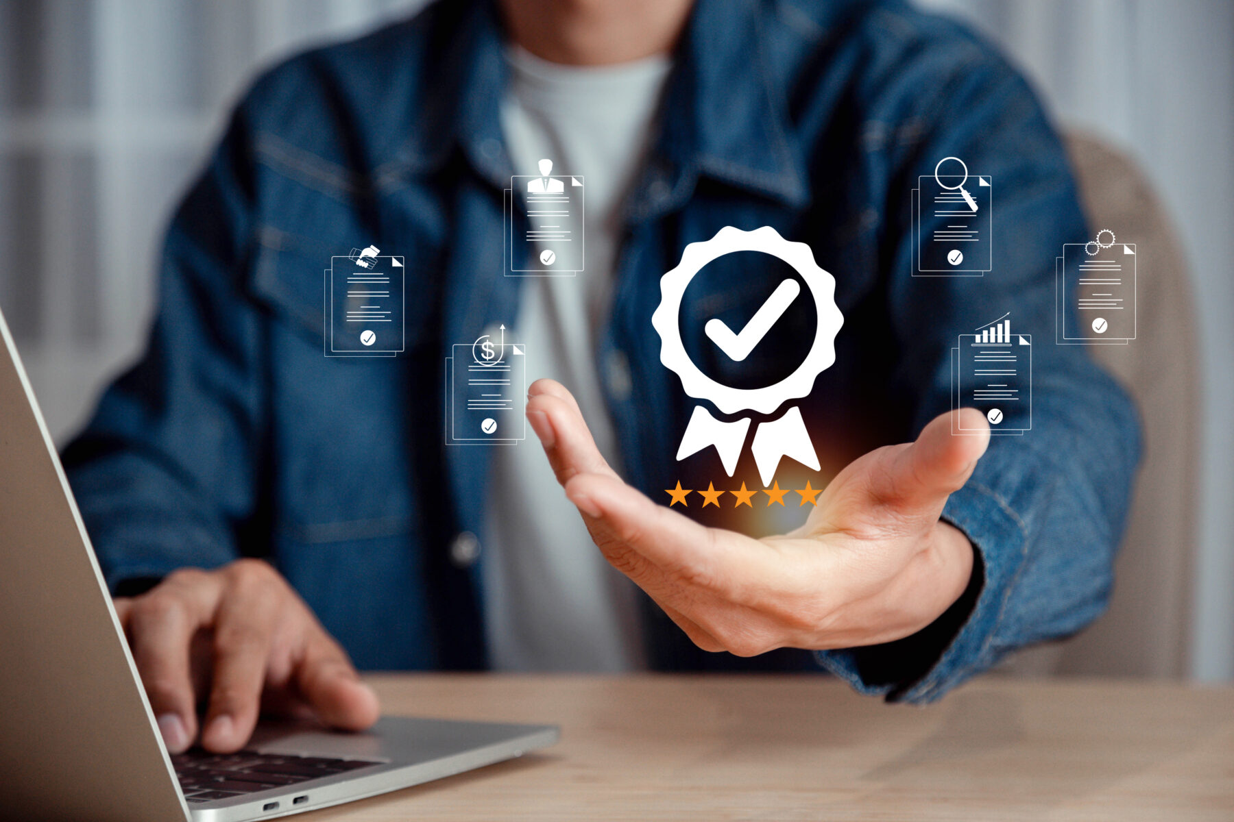 Person with laptop and accreditation overlay