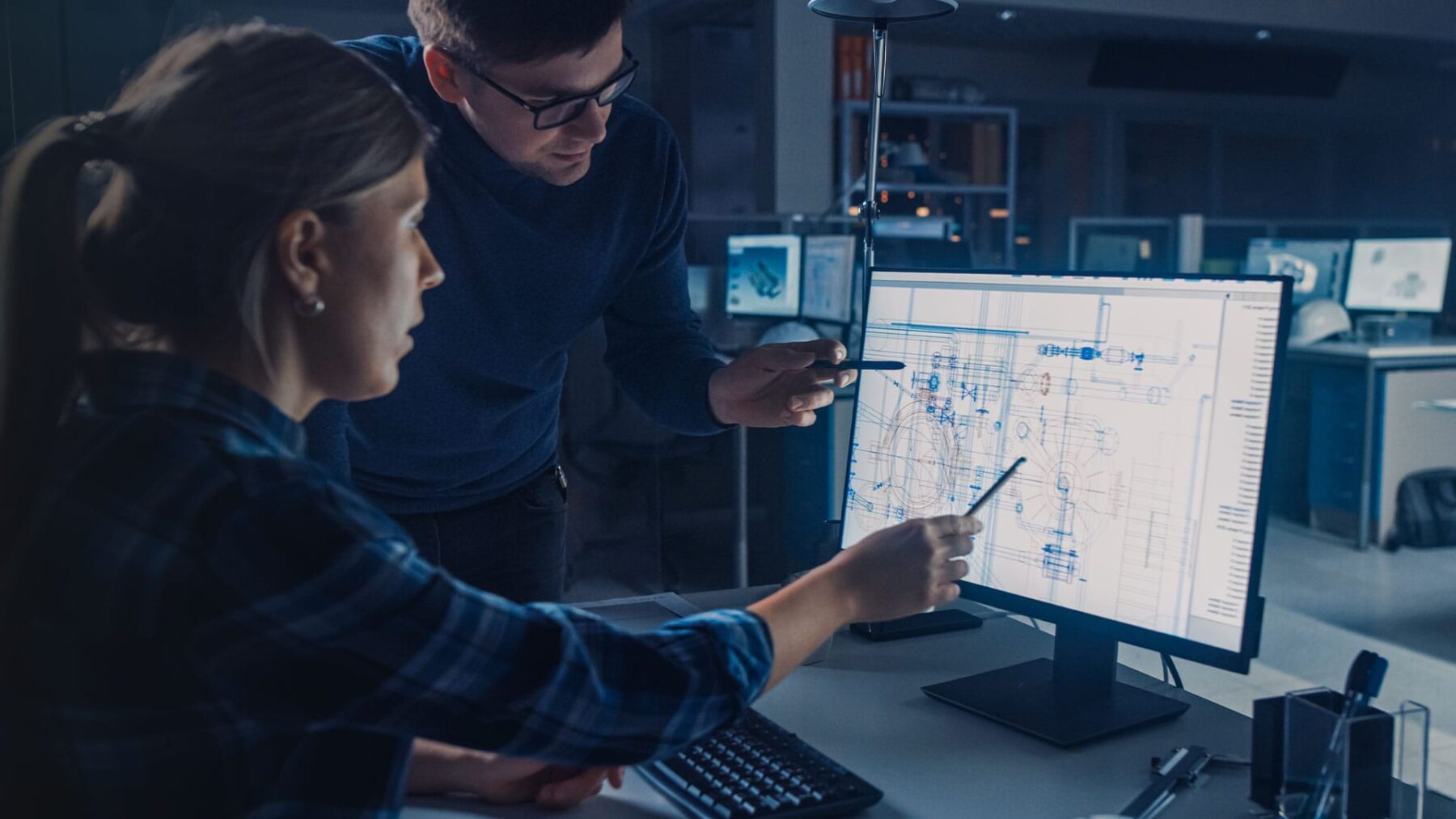 Engineers working at their workstation