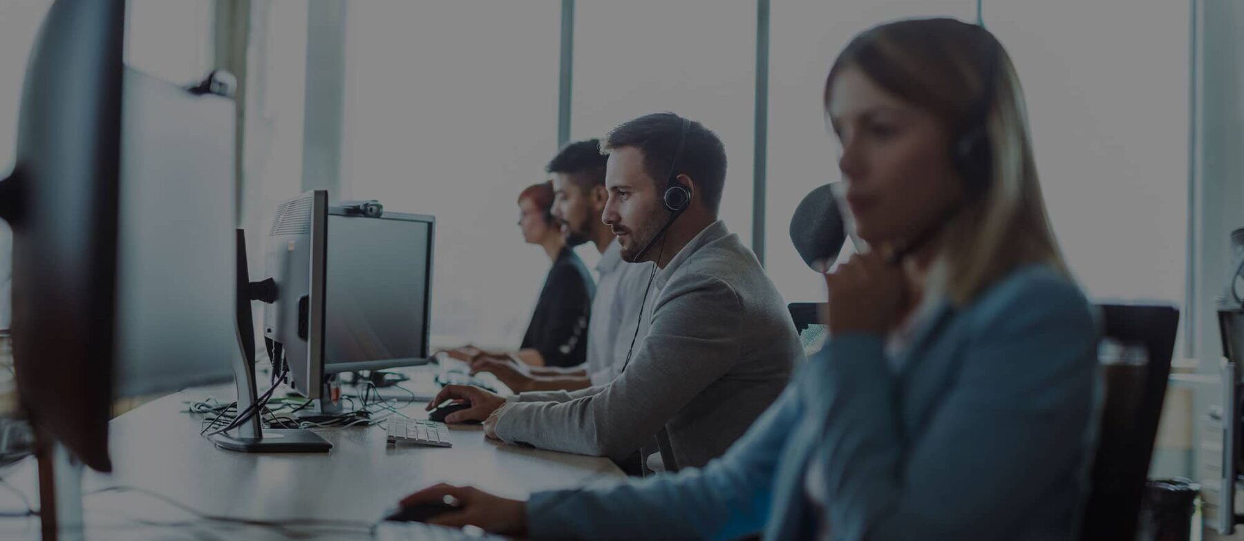Support operatives helping customers